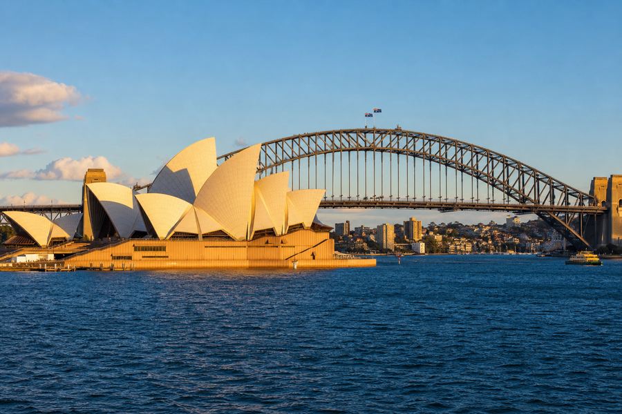 Sydney Opera House and Sydney Harbour Bridge at golden hour