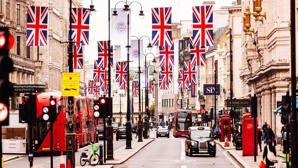 Union Jack flags hanging above a London street