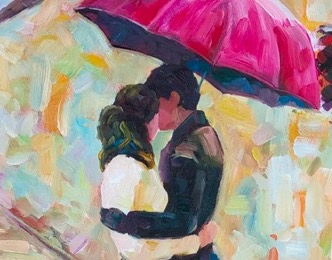 Couple kissing under an umbrella